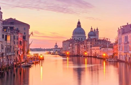 The warm colors and historic architecture of Venice’s Grand Canal